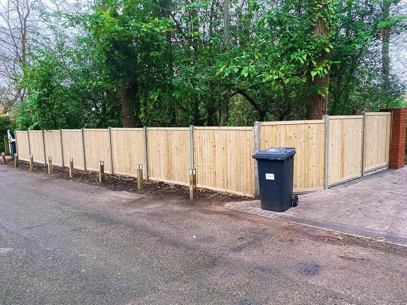 Closeboard fence installation completed